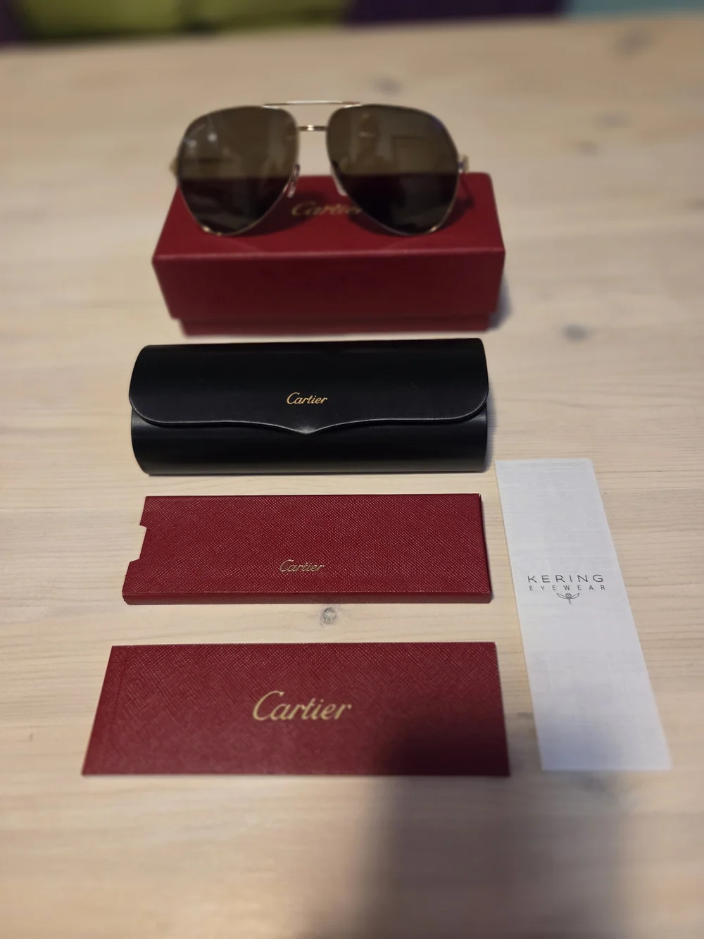 Cartier Gold Frame Sunglasses with Dark Gray Lenses